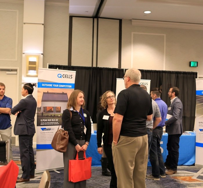 ATIGS exhibition booth and delegates