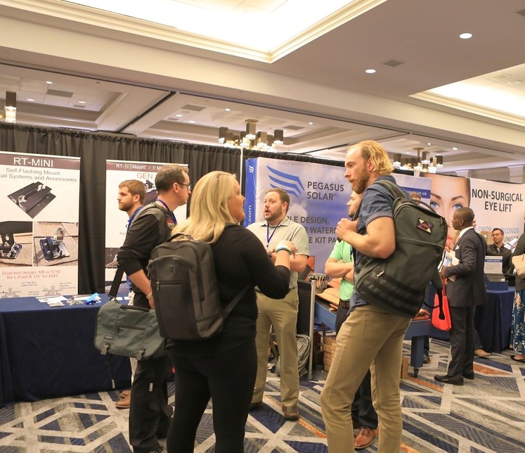 ATIGS exhibition booth and delegates