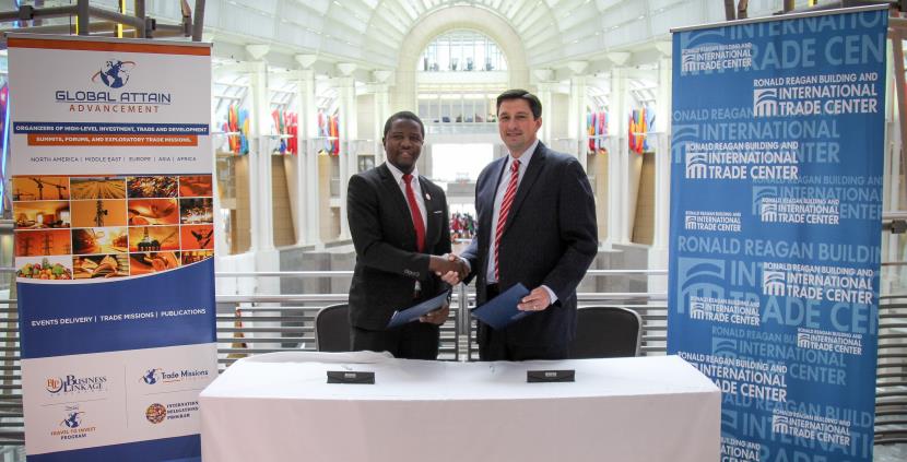 Handshake after a partnership signing between ATIGS Network partners