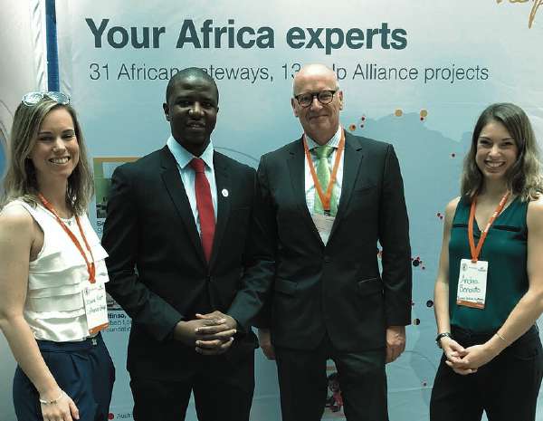 Executives meeting on the ATIGS exhibition floor