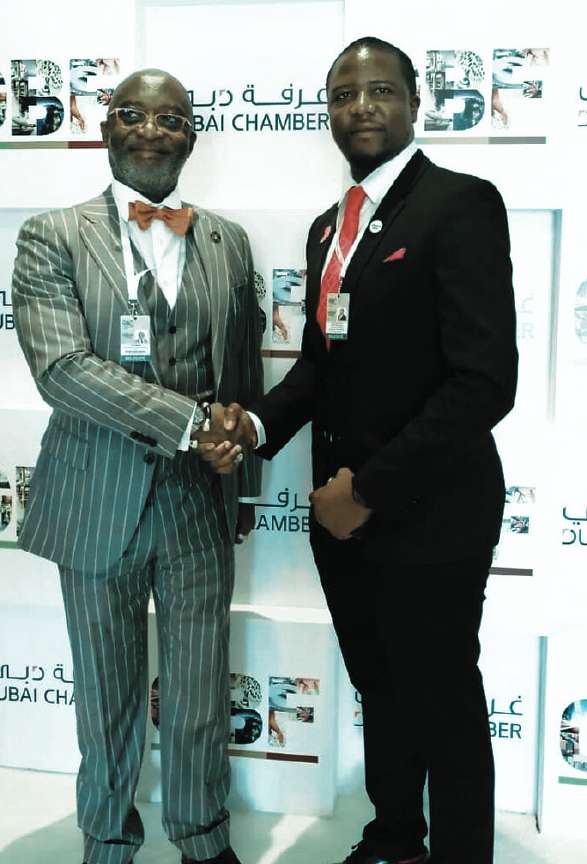 Handshake between ATIGS partners at a chamber of commerce