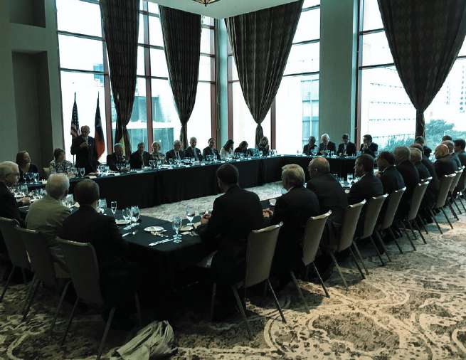 Delegates in discussion at an ATIGS trade forum