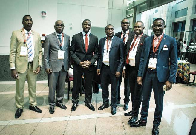 ATIGS delegation photographed at an official session