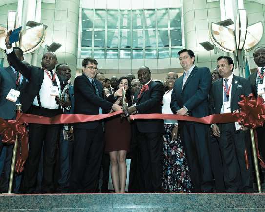 Ribbon-cutting ceremony opening an ATIGS expo
