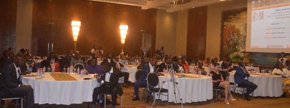 Seminar attendees seated at round tables