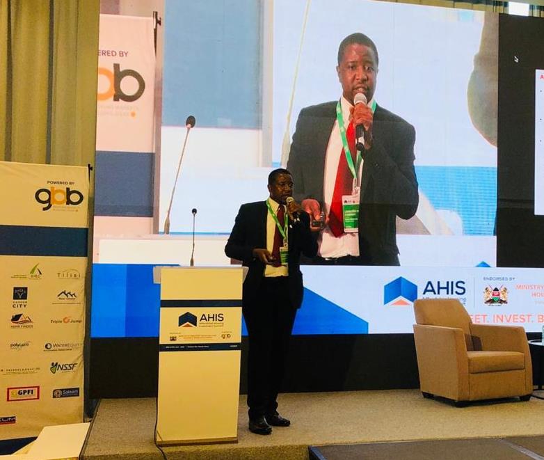 Speaker presenting at the AHIS podium