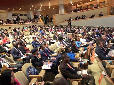 Delegates gathered in the summit hall at the Ronald Reagan Building